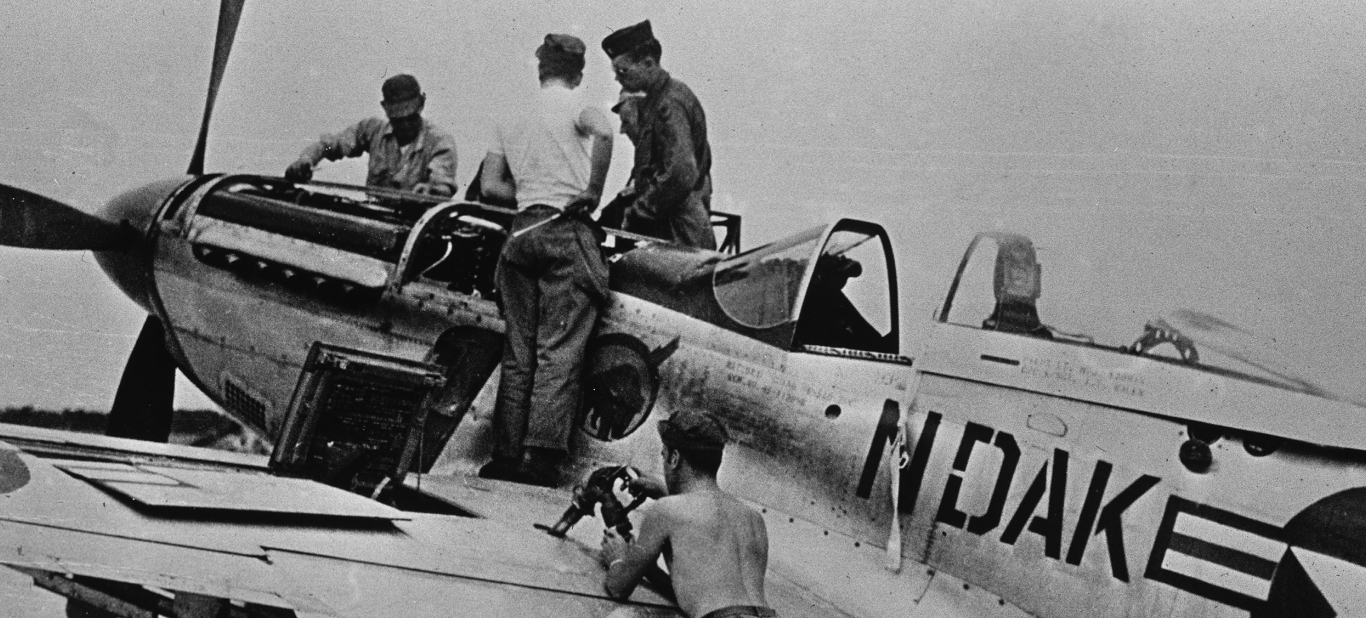 N.D. Air National Guard Airmen fuel and perform pre-flight maintenance on a F-51 Mustang aircraft at the air base in Fargo, N.D.