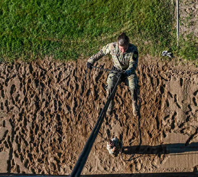Sgt. Riley Altenburg, 164th Engineer Battalion, rappels down the side of a tower as Sgt. Brandon Wendland, 957th Engineer Company, steadies the rope during the 2021 State North Dakota National Guard Best Warrior Competition at Camp Grafton Training Center on Aug. 16, 2020. (U.S. Army National Guard photo by Sgt. Michaela C.P. Granger, 116th Public Affairs Detachment)