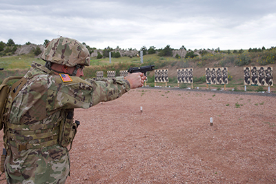 Sgt. Tyler Goldade, North Dakota Army National Guard, shoots a course of fire July 27, 2019, at Camp Guernsey, Wyo.