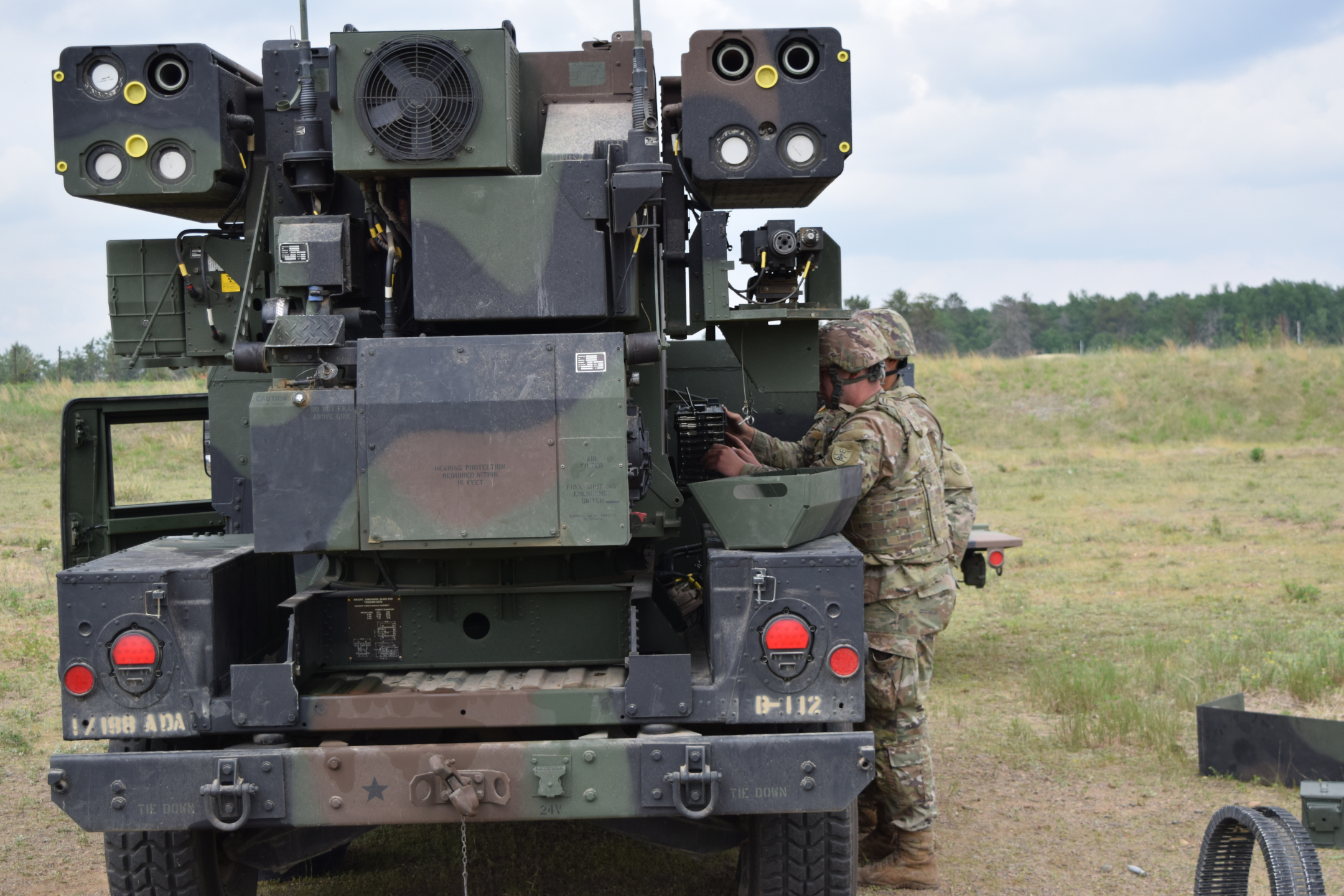Soldiers of the 1-188th ADA preparing their Avengers for an exercise during annual training.